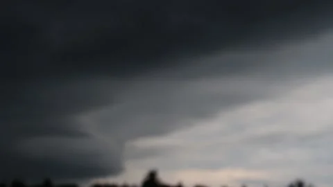Dark, ominous storm clouds gathering in the sky Stock Footage 345654169
