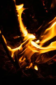 Dark or black background makes the light of the fire Stock Photos