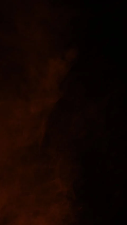 Dark orange ember fog at top of frame, vertical format Stock Footage 340134252