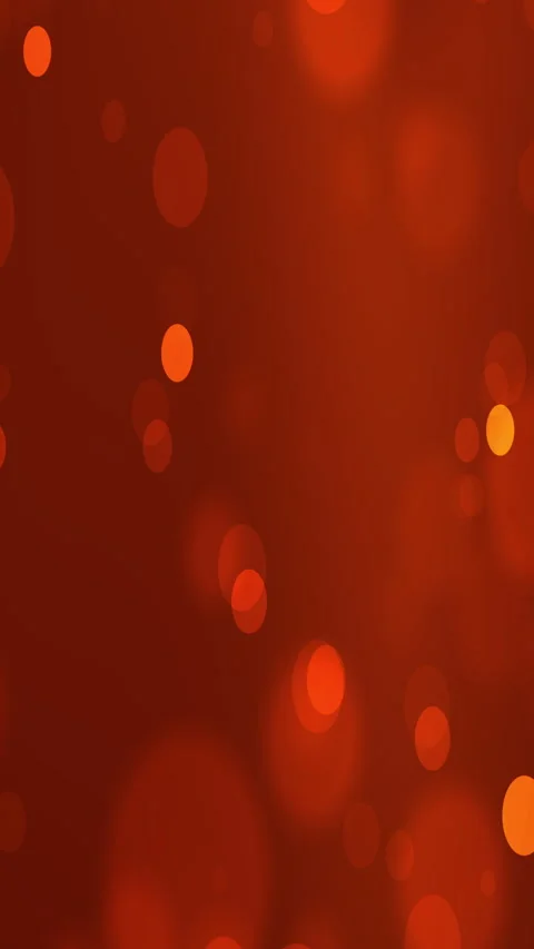 Dark orange gradient blurs into a warm background with round bokeh lights. Stockbeeldmateriaal 306360140