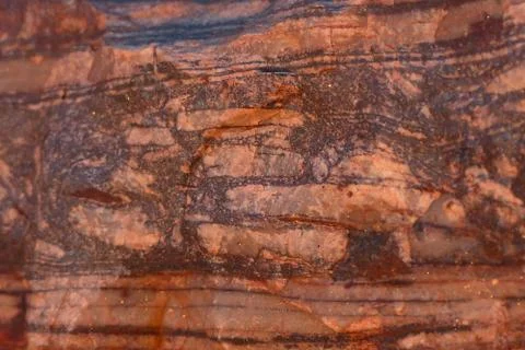 Dark orange stone texture. Abstract natural macro pattern. Stock Photos