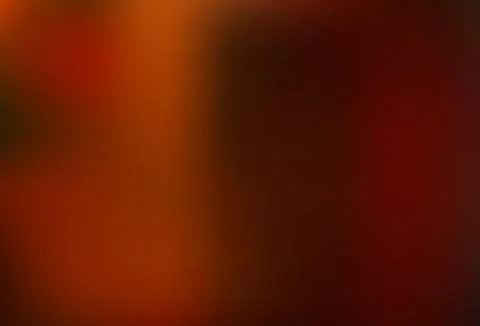 Dark Orange vector blurred and colored background. Stock Illustration
