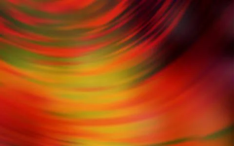 Dark Orange vector blurred bright texture. Stock Illustration