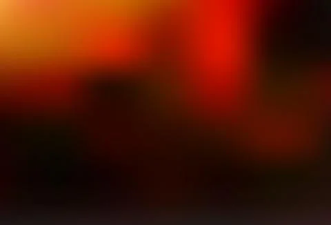 Dark Orange vector blurred shine abstract background. Illustrazione stock