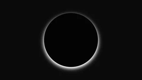 A dark orb eclipses the frame, edged by a soft white corona that pulses with Stock-Footage 331228386
