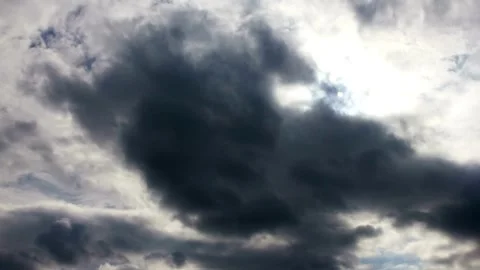 Dark overcast clouds on rain season weather stormy sky pitch black cloudy Stock Footage 336560708