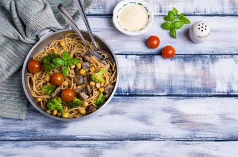 Dark pasta with vegetables Stock Photos