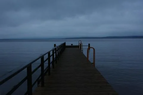 Dark pier Stock Photos