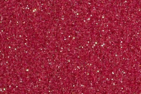 Dark pink background with glitter with light. Stock Photos