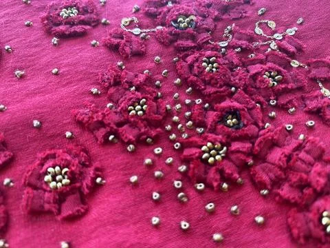 Dark pink patchwork embroidered flowers Stock Photos