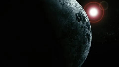 Dark planet in space with bright sun behind it, creating dramatic light, sh.. Stock Footage 340388818