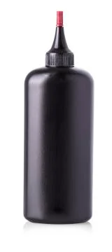 Dark plastic bottle  on white background. Stock Photos