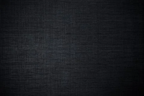 Dark plastic texture like a fabric with gradient light and shadows. Stock Photos