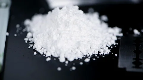 Dark plate with Cocaine (seamless loopable) Stock Footage 124813176
