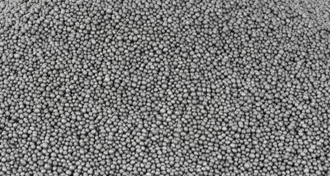 Dark polystyrene balls Full frame closeup showing lots of dark polystyrene... Stock Photos