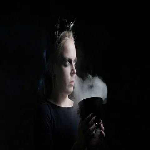 Dark portrait of evil witch with bowl. 4K UHD Vídeo Stock 69412537