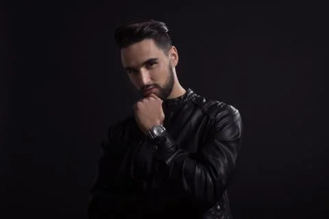 Dark portrait young man posing model Stock Photos