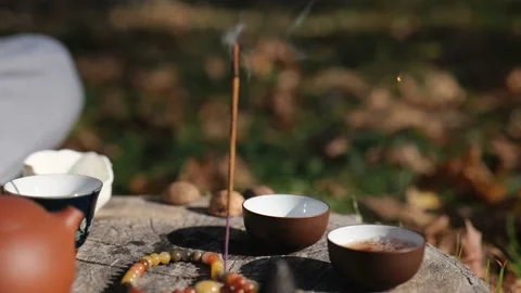 Dark pu-erh is poured into tea bowls. chinese tea ceremony concept. utensil.. Stock Footage 229858691