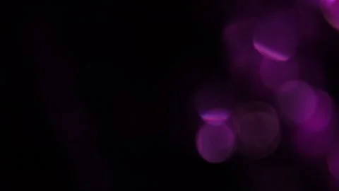 Dark purple bokeh light overlay on the right Видео 318947709