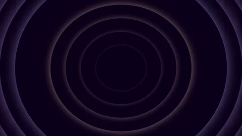 Dark purple circular rings radiating from a deep black central focal point Video stock 335117262