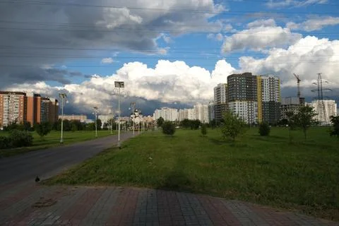 Dark rain clouds against the background of the Moscow sleeping area. Stock Photos