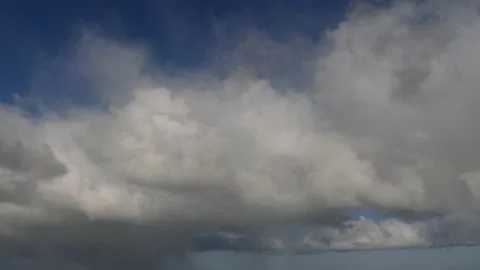 Dark rain clouds over the ocean - sky background - time lapse Stock Footage 143591794