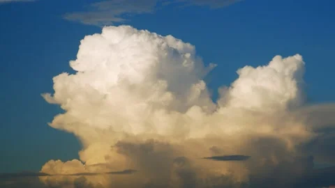 Dark rain clouds rolling in on a spring day. 4k60p Stock Footage 132223335