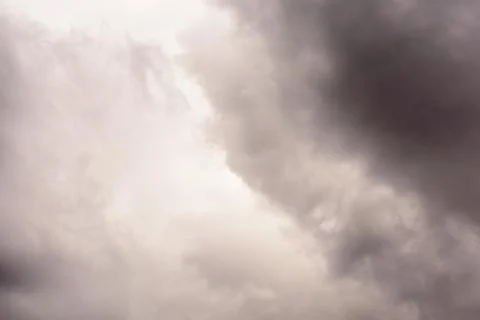 Dark Rain Clouds before thunderstorm. Grey Storm Clouds Before Rain. Stock Photos