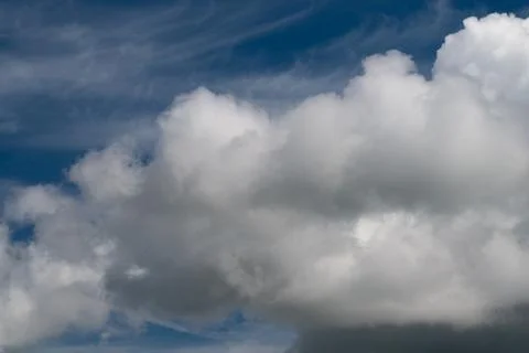 Dark rain imminent. Approaching storm clouds gather overhead. Ominous black.. 写真素材