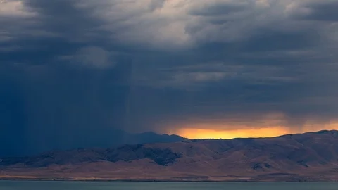 Dark rainstorm rolling across the landscape covering up the horizon 스톡 동영상 92219618