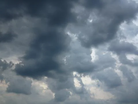 Dark rainy clouds Stock Photos