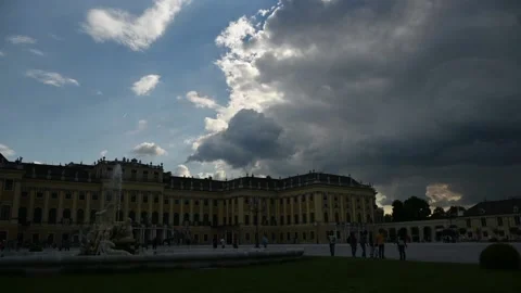 Dark rainy dramatic sky above Schonbrunn (Schloss Schönbrunn) time lapse Stock Footage 134989352
