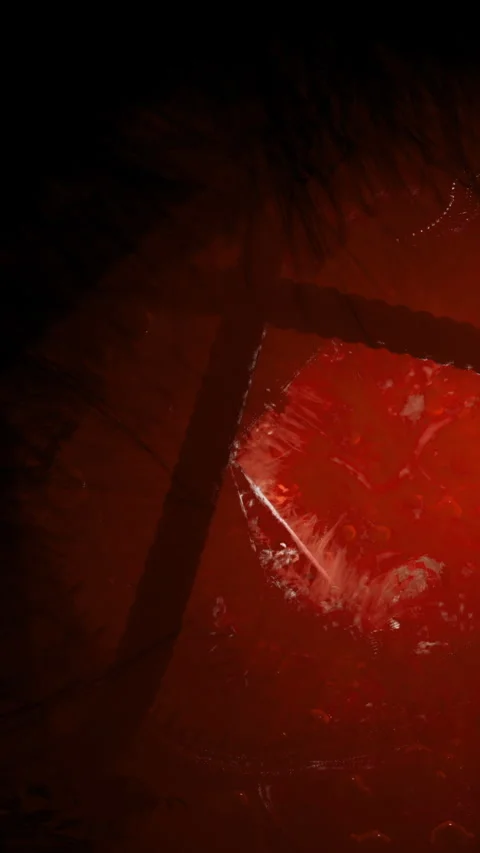 Dark red abstract shapes with light from below showing texture and form Stock Footage 332210987