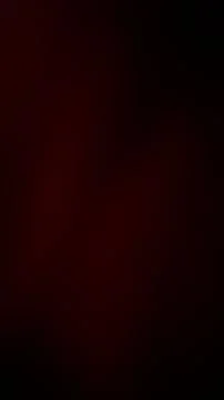 Dark red and black grainy textured abstract background vertical gradient gr.. Stock Photos