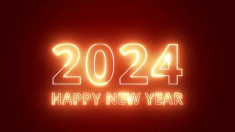 On a dark red background, the numbers 2024 and the text Happy New Year glow with Stock Footage 252717217