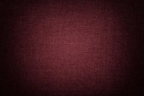 Dark red background from a textile material. Fabric with natural texture. Bac Illustrazione stock