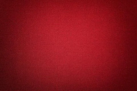 Dark red background from a textile material with wicker pattern, closeup. Foto stock