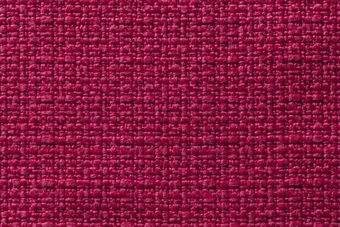 Dark red background from a textile material. Fabric with natural texture. Bac Stock Photos