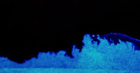 Dark red bleeding into light blue colors. Abstract colorful background Video stock 81489068