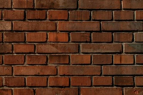 Dark red brick wall texture. Abstract background pattern Foto stock