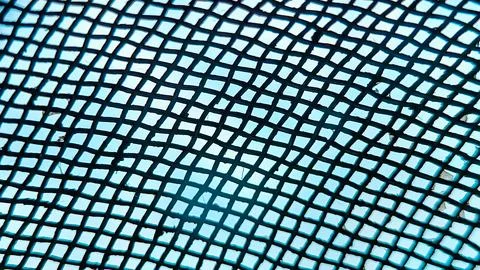 Dark Red Brown Mesh Texture Background, Moody Grid Pattern with Blue Accent.. Stockfoto's