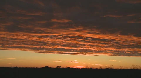 Dark red clouds at sunset Vídeo Stock 3980076