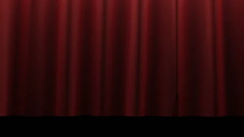 Dark red curtain sways without touching the black floor. Today they will show a Stock Footage 129885189