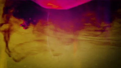 Dark red drink flows into water and spinning. Abstraction liquid filling water Stock Footage 162046998