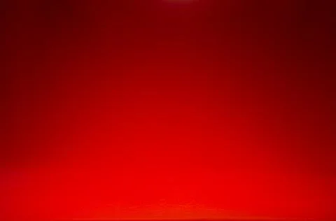 .Dark red empty scene with beam of light on wall, gradient. Rich abstract sta Stock Photos
