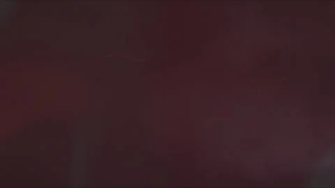 Dark red film texture with subtle scratches and light leaks	 Stock Footage 291897215