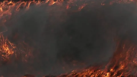 The dark red flame is almost invisible due to the thick smoke. Top view of the Stock Footage 170190214