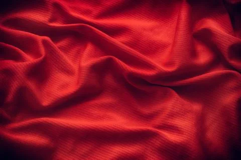 Dark red folded fabric texture background Stock Photos