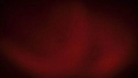 Dark red grainy abstract background with soft gradients and textured grunge.. 스톡 사진