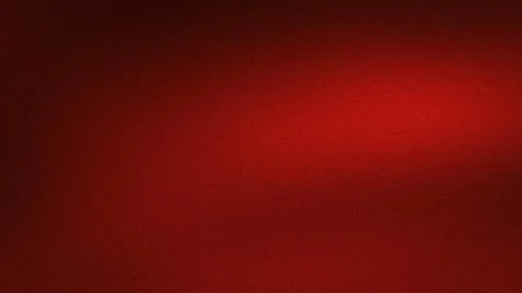 Dark red grainy abstract background texture with subtle light gradient blur.. Stock Photos